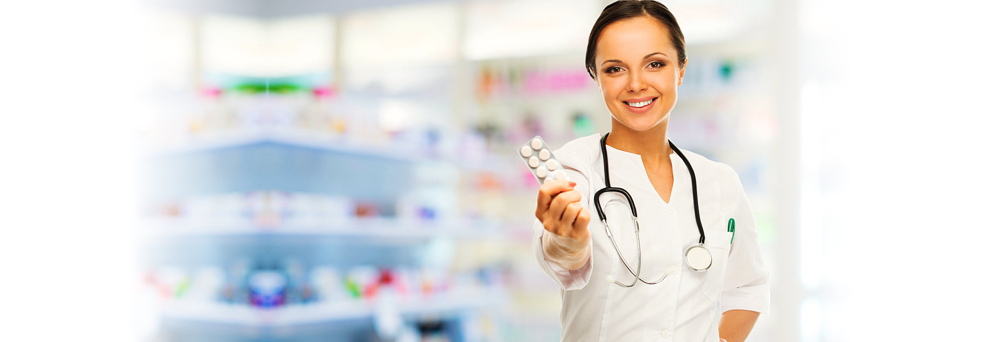 pharmacist holding medicines